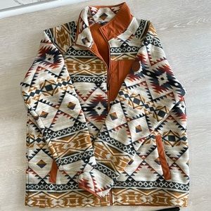 Orange tribal alpine design fleece zip up